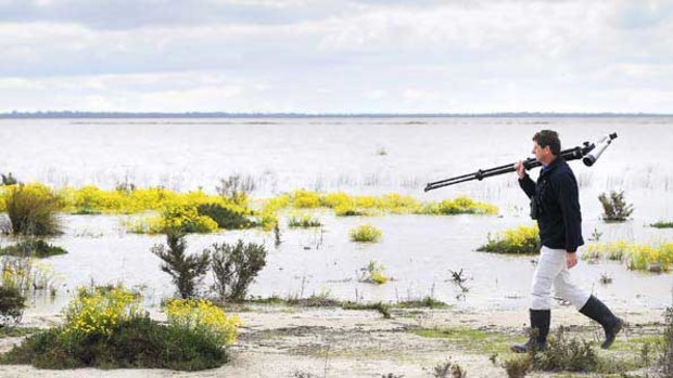 Bird watcher Jonathan Starks at Lake Hindmarsh following recent heavy rains.