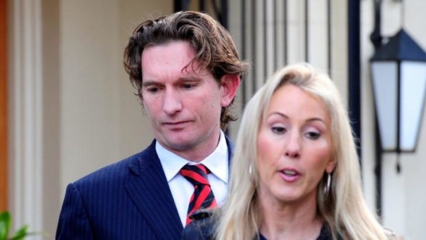 James Hird and his wife Tania leaving their Toorak home in August 2013.