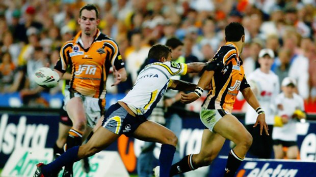 Passing as a great ...Tigers superstar Benji Marshall sets up one of the most memorable grand final tries of all time when he flick passes to Pat Richards against the Cowboys.