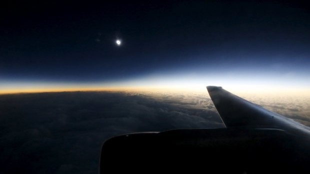 A view from a plane during a so-called "Eclipse Flight" from the Russian city of Murmansk to observe the solar eclipse above the neutral waters of the Norwegian Sea.