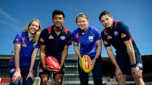 Looking forward: Western Bulldogs Womens team and the Footscray Bulldogs VFL team members (left to right)  Lauren Arnell, Lin Jong, Aasta O'Connor and Jason Tutt welcome the boost to Whitten Oval.