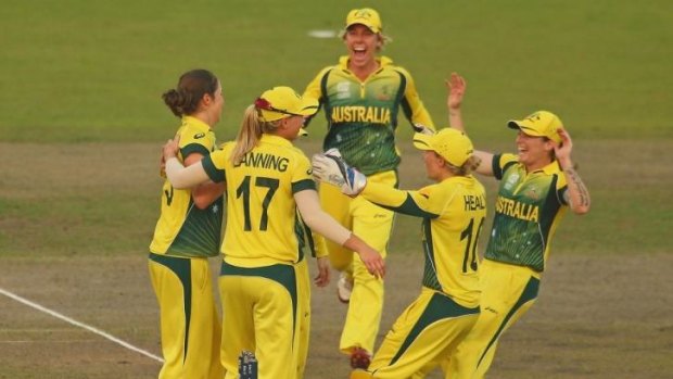 The Australians celebrate their win over the West Indies.