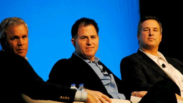 Michael Dell, centre, between Steve Felice, Dell president and chief commercial officer (left) and Marius Hass, president enterprise solutions, at Dell World 2012.