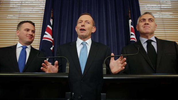 Opposition Leader Tony Abbott (with fellow Liberal MPs Jamie Briggs, left, and Shadow Treasurer Joe Hockey) said he has some reservations about the local government referendum.