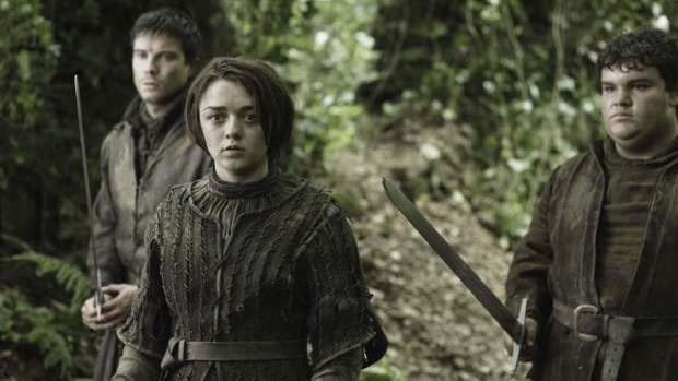 Maisie Williams as Arya Stark, roaming the woods of Westeros (Northern Ireland).