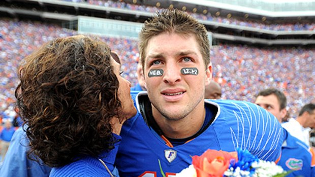 Evangelical Christian and star college football quarterback Tim Tebow with his mother Pam.