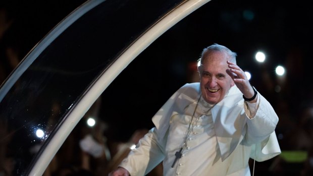 Pope Francis waves to the faithful upon his arrival in the Philippines on Thursday.