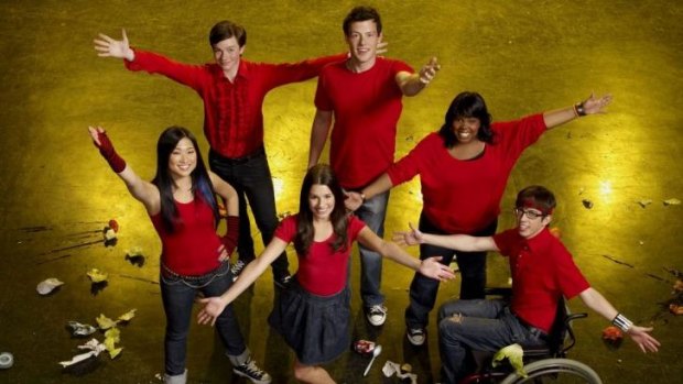 Hacked not sacked ... Chris Colfer, top left, with his Glee cast mates.