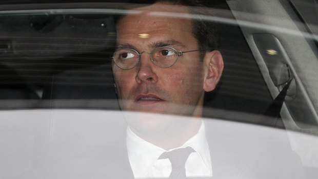 James Murdoch leaves the annual general meeting of BSkyB after resisting calls for him to stand down.