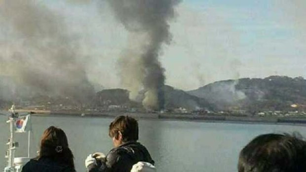 Smoke is seen at Yeonpyeong island near the border against North Korea, in South Korea.
