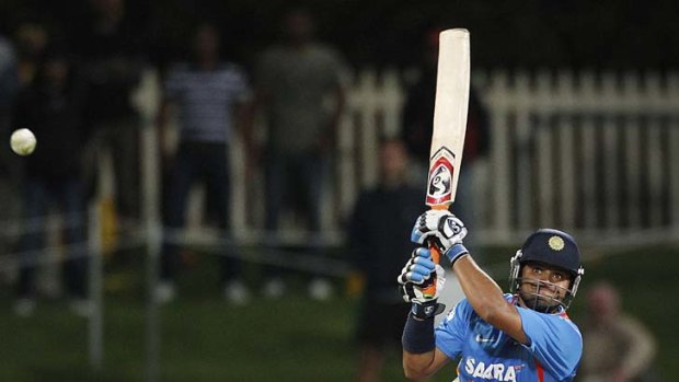 The tonk ...  Suresh Raina gives it a good swing as India complete a stunning win at Bellerive Oval in Hobart.