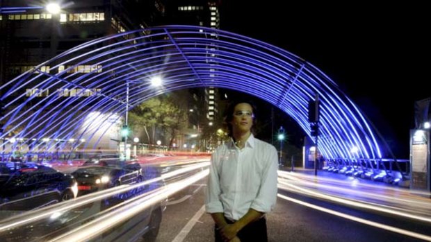 Vision splendid ... architect Joe Snell in Macquarie Street under the blue-lit arch which, he says, was inspired by Governor Macquarie's idea of a fair go.