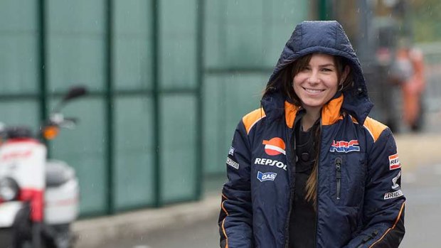 Competing priorities ... Adriana Stoner with the couple's daughter Alessandra at the French GP today.