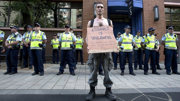 A protester makes a stand at the new Occupy Melbourne site of Bowen Lane at RMIT's city campus yesterday.