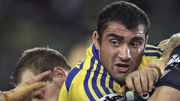In the thick of it . . . Parramatta's powerhouse prop Tim Mannah takes some stopping.