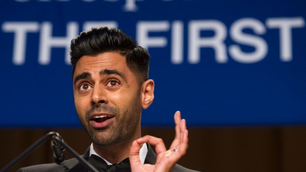 The Daily Show correspondent Hasan Minhaj entertains the guests at the White House Correspondents' Dinner in Washington, Saturday, which Donald Trump decided not to attend. 