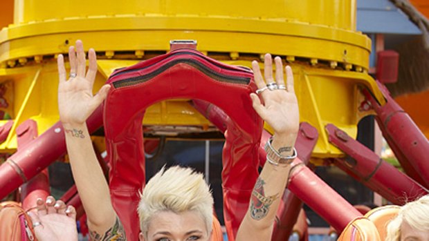 Ruby Rose tests out The Claw at Dreamworld.