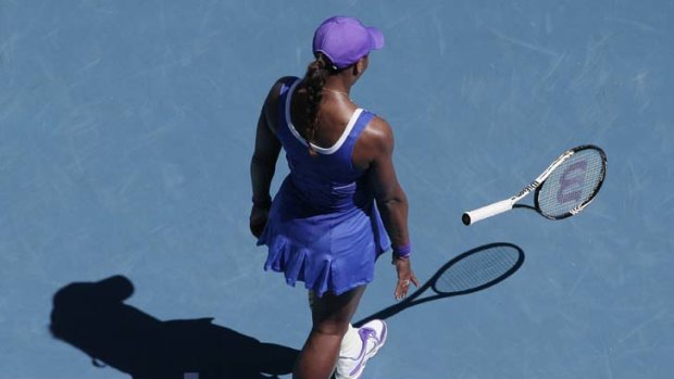 Highly strung &#8230; Serena Williams throws her racquet to the ground during her shock defeat to Ekaterina Makarova yesterday.