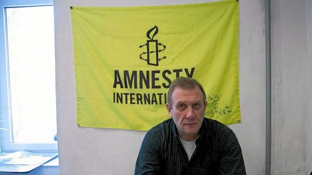 Amnesty International Russia chief, Sergei Nikitin, in his office in Moscow on Monday after the raid.