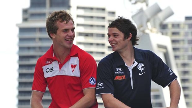 Tom Mitchell (left) went to Sydney and Dylan Buckley to Carlton, both under the father-son rule.