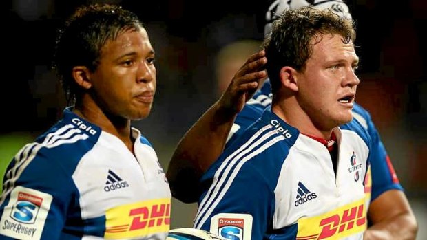 Two tries: Stormers kicker Deon Fourie (c) is congratulated by teammates.