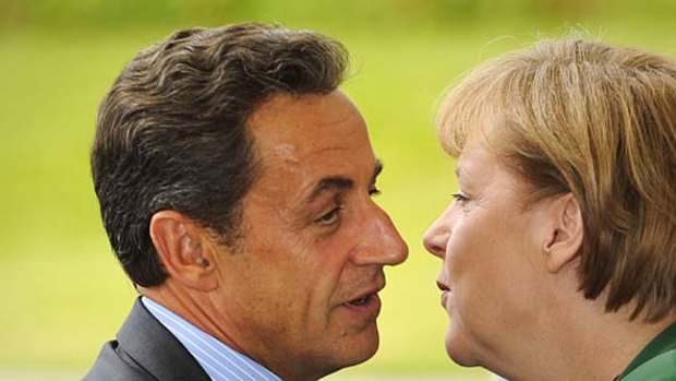Challenges: French President Nicolas Sarkozy and German Chancellor Angela Merkel.