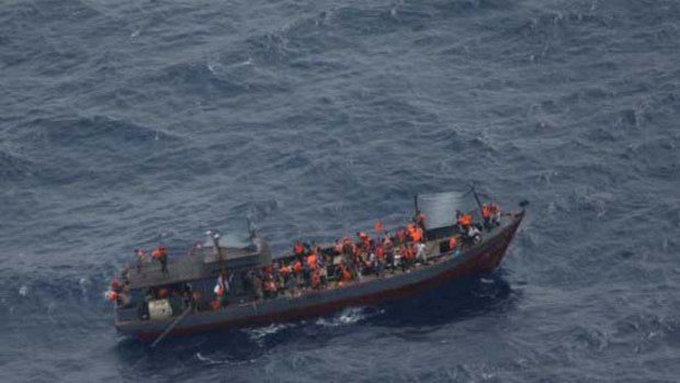'In distress' near Christmas Island ... Australian authorities rescue 85 people from a suspected asylum seeker boat.