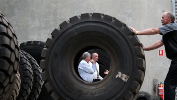 Wheel truth ... Warren Truss and Ken O’Dowd spent the day in Gladstone allaying fears the Coalition would bring back Work Choices.