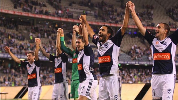 Brothers in arms: Melbourne Victory pulled itself out of the fire on Friday night and snatched away Perth's Glory.