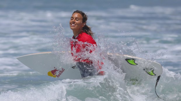 Sally Fitzgibbons enters the water.