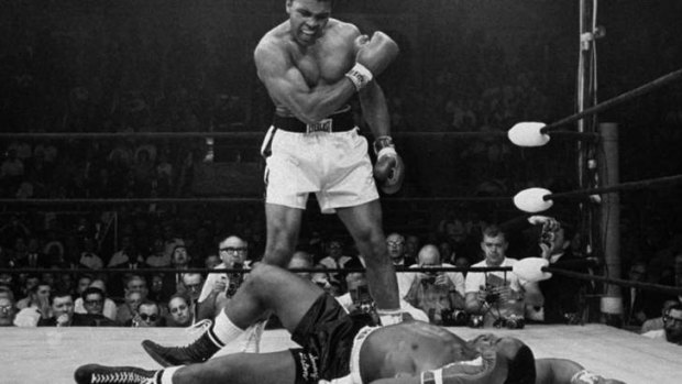 Muhammad Ali stands over fallen challenger, Sonny Liston, in their 1965 rematch.