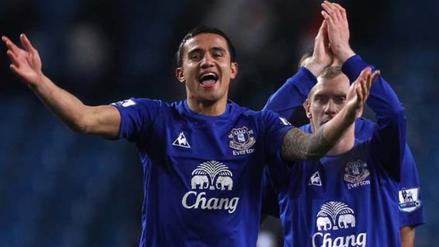 Goal hero ... Tim Cahill, left, celebrates after Everton's victory over Manchester City.