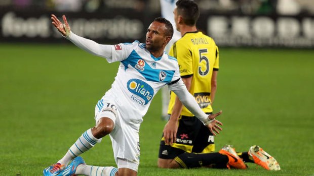 Archie Thompson appeals for a foul.