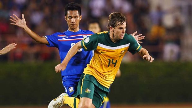 Job done: Brett Holman's goal last night secured Australia's progression in the World Cup.