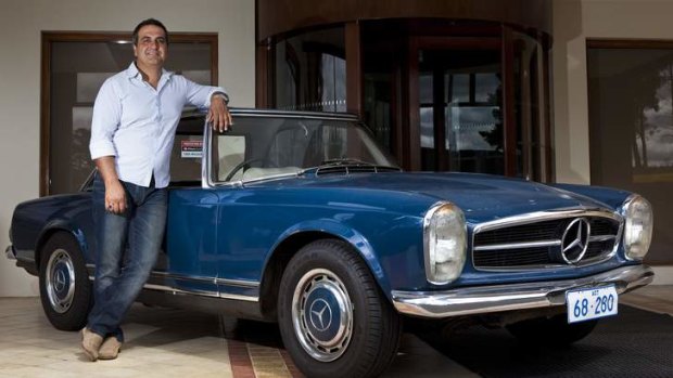 Hamid Heydrian with his Mercedes-Benz type 113, the classic "pagoda roof" sports car.