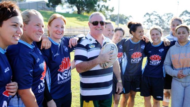 Lean on me  ...  former NRL coach Graham Murray training the Jillaroos, members of the Australian Women's Rugby League team at Ryde.