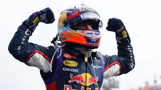 Speed merchant : Daniel Ricciardo celebrates victory in Hungary. 