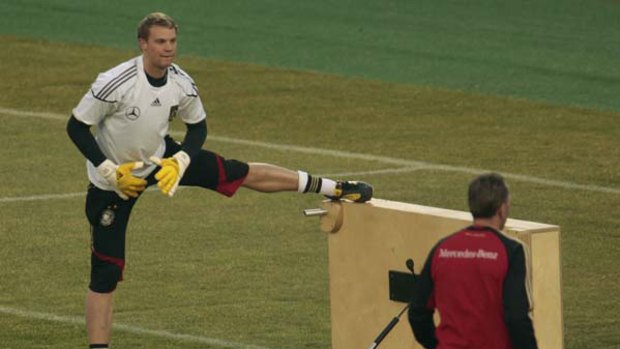 Germany's Manuel Neuer warms up during a training session in Pretoria.