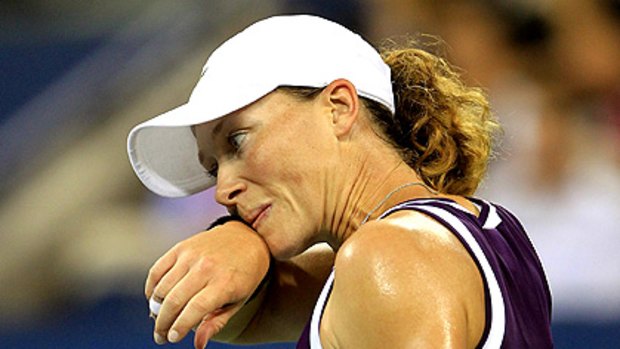 Australia's Sam Stosur feels the strain of her quarter-final clash with Kim Clijsters.
