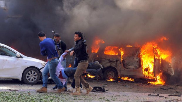 Deadly blast ... nearly 60 people were killed by a bomb in Damascus.
