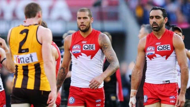 Lance Franklin and Adam Goodes walk off in shock after the game.