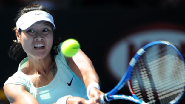 Coming at you ... China's Li Na on her way to a straight-sets victory over German Andrea Petkovic in Melbourne yesterday.