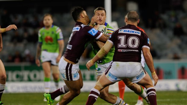 Jack Wighton takes on the Sea Eagles defensive line in June.