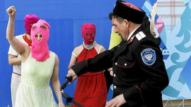 Whipped: Members of the punk group Pussy Riot are attacked by Cossack militia in Sochi.