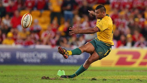 Back in action: Kurtley Beale slips as he misses his final attempt against the British and Irish Lions.