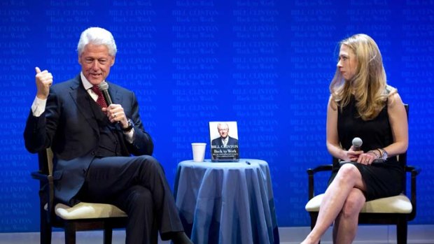 On the job ... looking comfortable in her new role, Chelsea Clinton interviews her father and former US president Bill Clinton about his latest book, <em>Back to Work</em>.