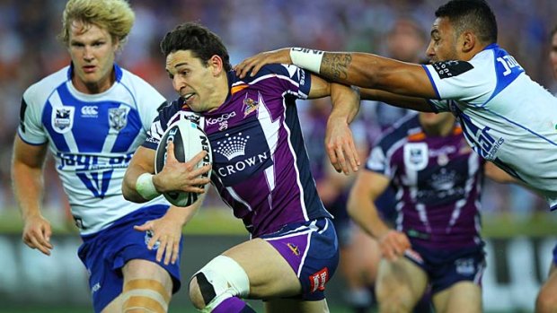 Charging away: Storm champion Billy Slater makes a break.