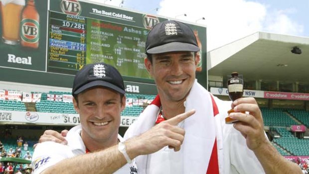 You've earned it ... Andrew Strauss and Kevin Pietersen with a replica of the Ashes. Australia will be lucky to see the real thing any time soon.