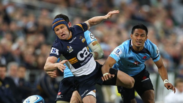 Matt Giteau tries to spark the underperforming Brumbies during their heavy loss to the Waratahs on Saturday night.
