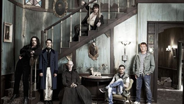 Housemates from Hell: Jemaine Clement, Taika Waititi, Ben Fransham,Jonny Brugh (on staircase), Cori Gonzalez-Macuer and Stu Rutherford in <i>What We Do in the Shadows</i>.